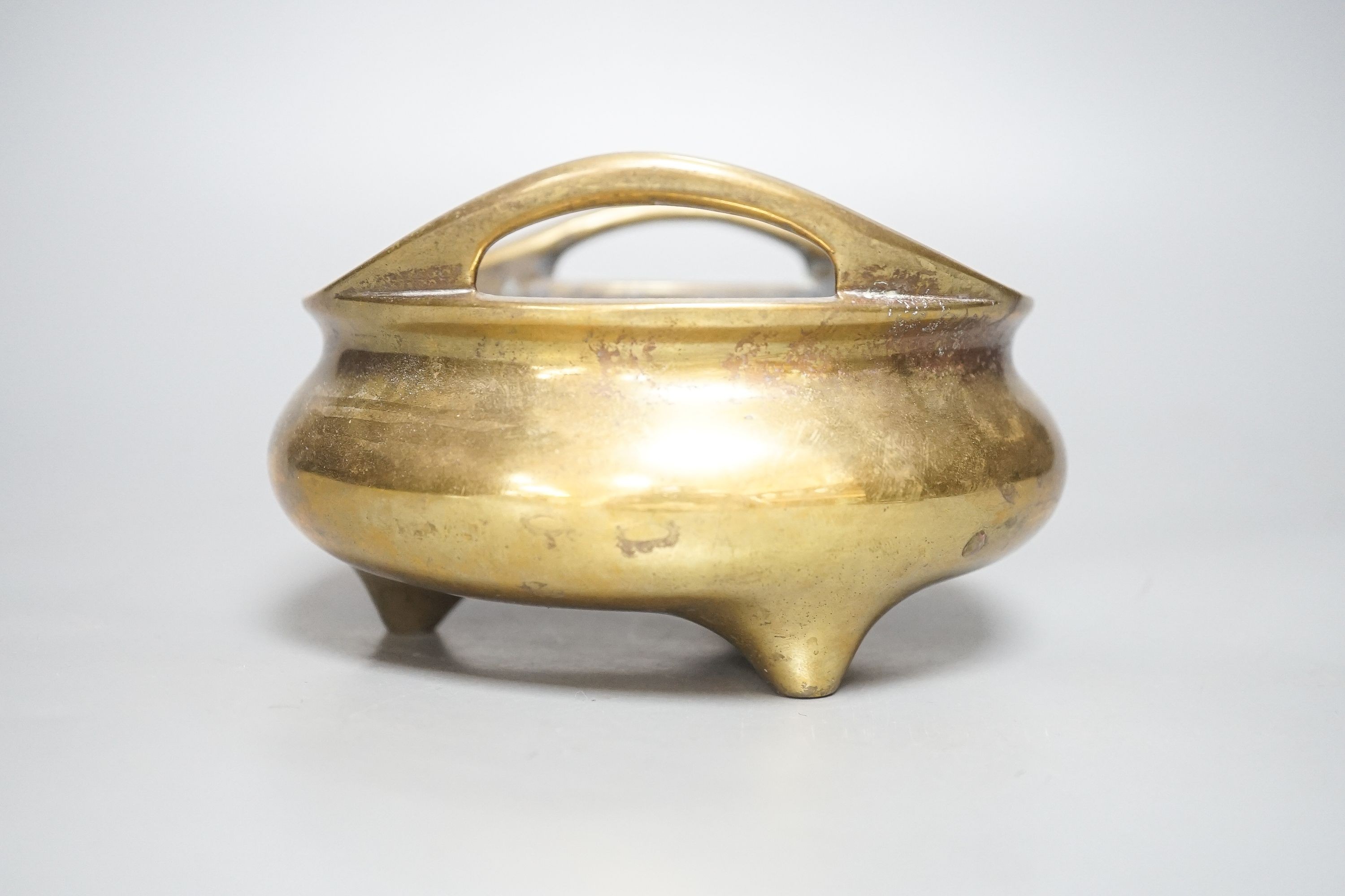 A Chinese bronze ding censer, Xuande sixteen character mark but 19th century, diameter 15cm